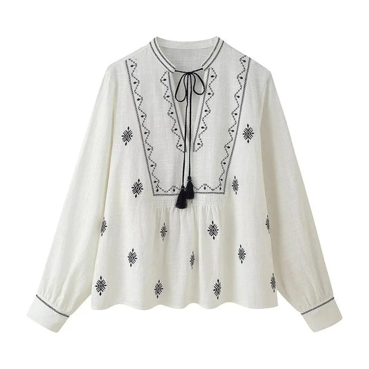Embroidered Boho Blouse with Tassel Tie – White & Black Detailing